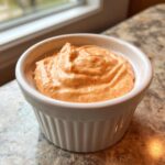 Close-up of creamy, orange-tinted big mac sauce recipe copycat in a small white ramekin.
